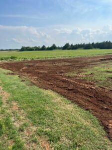 5683794675fc880820231105-49-egugec | Cyclone Septic & Plumbing final grade of a lateral field septic system installed by Cyclone Septics in Guthrie Oklahoma