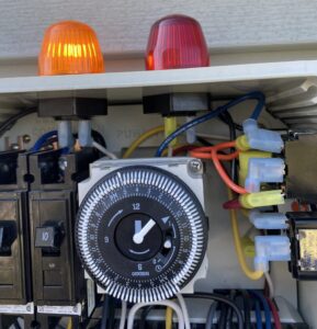 aerobic system control panel with alarm light on | Cyclone Septic & Plumbing | Cyclone Septic & Plumbing aerobic system control panel with alarm light on