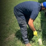 Cyclone Pro Services technician inspecting a septic and plumbing line at an Oklahoma home with professional camera equipment.