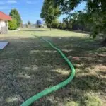 Edmond Septic Tank Pumping Service | Cyclone Septic & Plumbing Cyclone septic pumping truck at a residential property in Edmond, Oklahoma