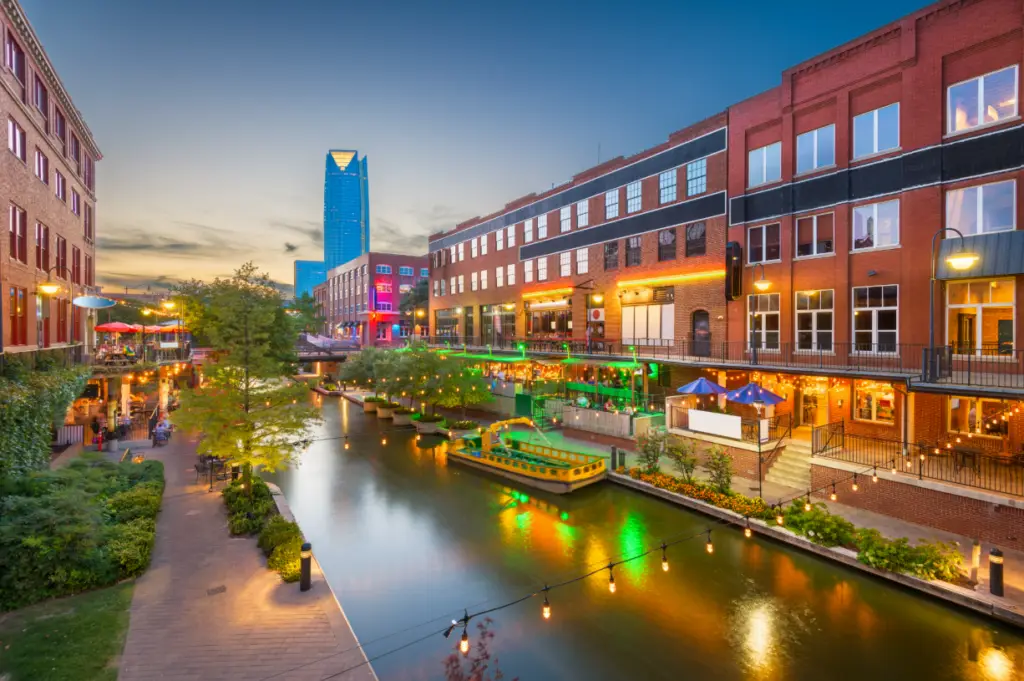 Bricktown Canal in Oklahoma City, OK | Cyclone Septic & Plumbing | Cyclone Septic & Plumbing Bricktown Canal and downtown Oklahoma City skyline at sunset