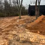Septic System Install Site - Jones, Oklahoma | Cyclone Septic & Plumbing New septic installation site on rural acreage in Jones, OK, showing red clay dirt typical of the area