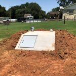 In-Ground Storm Shelter Installation in Choctaw, OK | Cyclone Septic & Plumbing In-ground storm shelter installed on a rural property in Choctaw, Oklahoma
