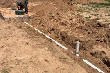 Cyclone Septic & Plumbing crew installing a septic tank system in Crescent, Oklahoma