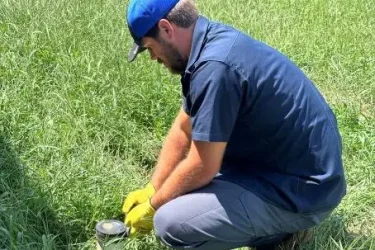 Cyclone Septic & Plumbing technician performing aerobic septic system maintenance in Piedmont, Oklahoma