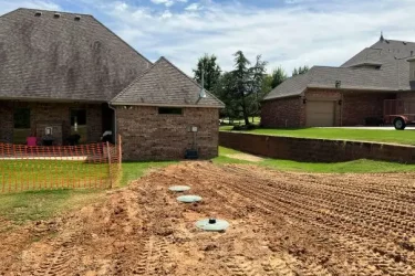 Newly installed aerobic septic system with access risers at an Oklahoma City home