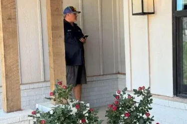 Cyclone septic service technician at a home in Edmond, Oklahoma