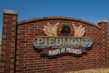 City of Piedmont Oklahoma welcome sign with “Winds of Progress” slogan
